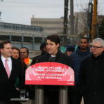 Justin Trudeau speaking at podium in Toronto