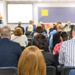 People participating in a community meeting