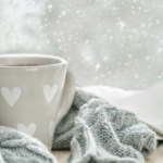 Mug on table with blanket